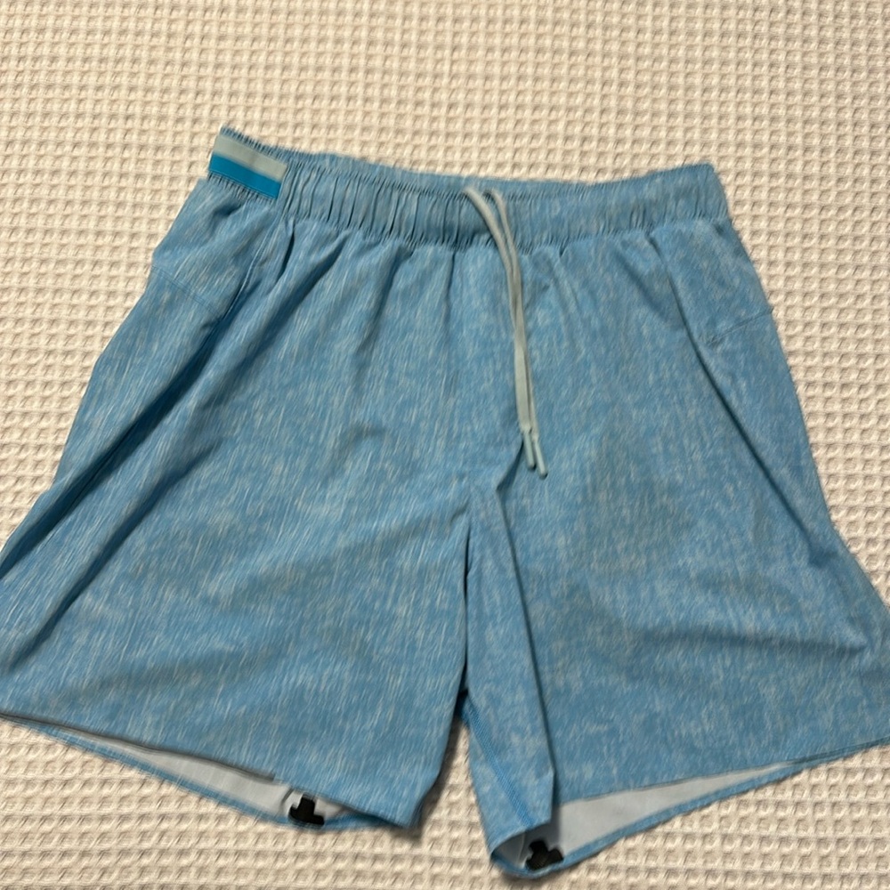 Fast ans Free lined shorts 2 pair $25.00 each 1 red , 1 blue